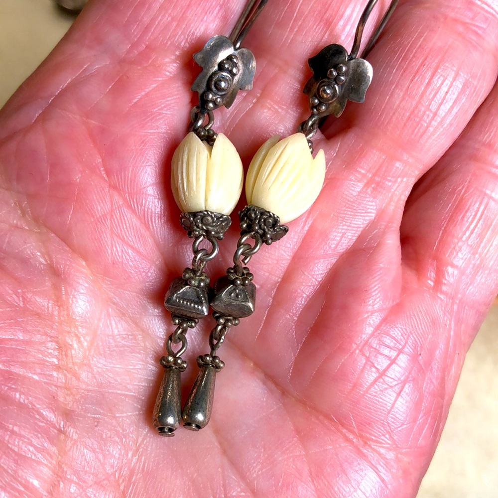 Carved bone and Bali silver earrings